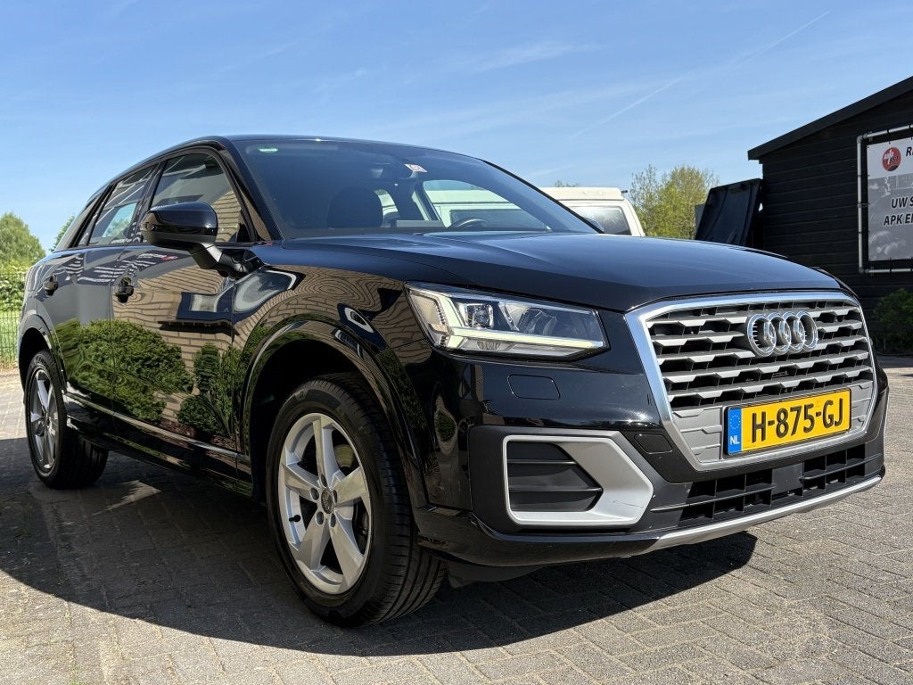 Audi Q2 30 TFSI Sport TREKHAAK-NAVI-CRUISE -12 MND MOBILITEI, Dealer onderhouden, Gebruikt, 116 pk, Zwart