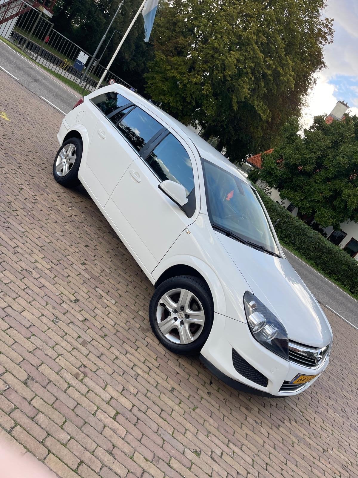 Opel Astra 1.6 16V 85KW St.wgn. 2010 Wit, Voorwielaandrijving, 15 km/l, Wit, Origineel Nederlands