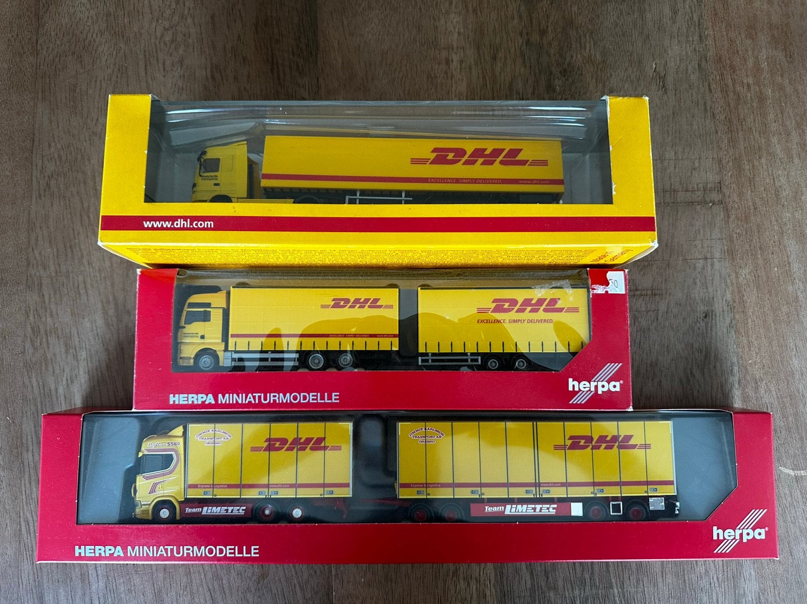 Herpa 1:87 DHL set inclusief zeldzame Jimmie Karlsson Scania, Ophalen of Verzenden, Zo goed als nieuw, Overige typen, Herpa
