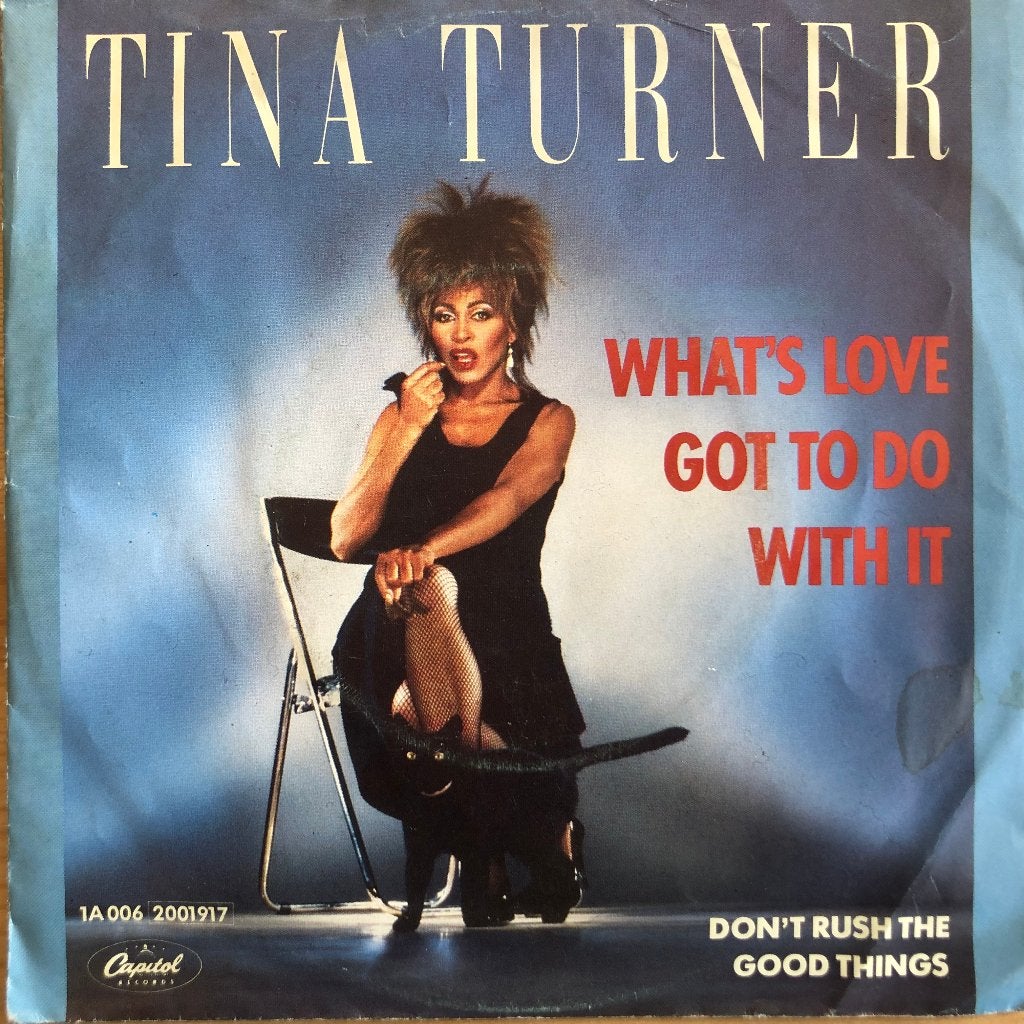1984	Tina Turner	What's Love Got To Do With It, Fotohoes, 7 inch, Ophalen of Verzenden, Zo goed als nieuw