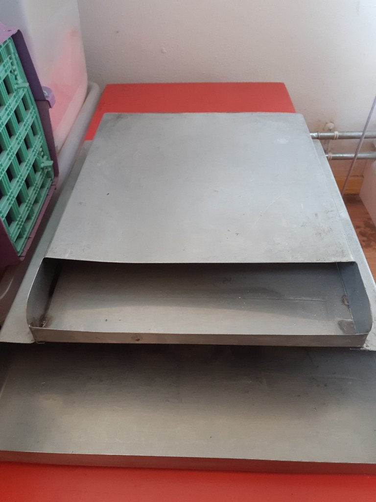 RVS inpaktafel-module of vloeipapierhouder, Ophalen