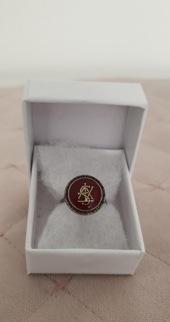 Set Yves Saint Laurent knopen ,ring met armband., 20 of groter, Ophalen of Verzenden, Zo goed als nieuw, Dame
