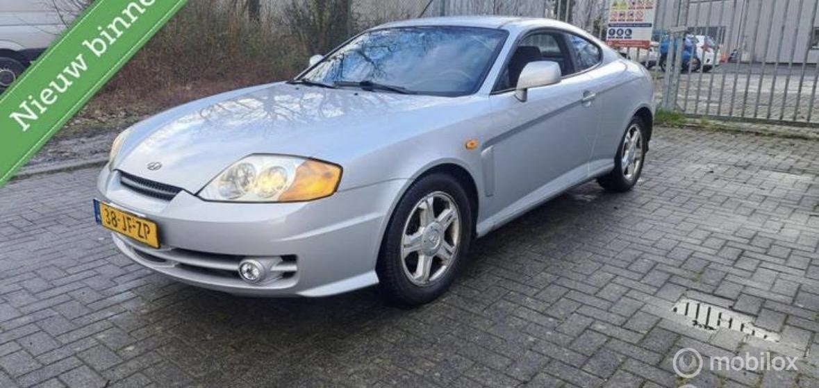 Hyundai Coupé 2.0i FX, Auto's, Voorwielaandrijving, Gebruikt, Verwarmde buitenspiegels, Origineel Nederlands