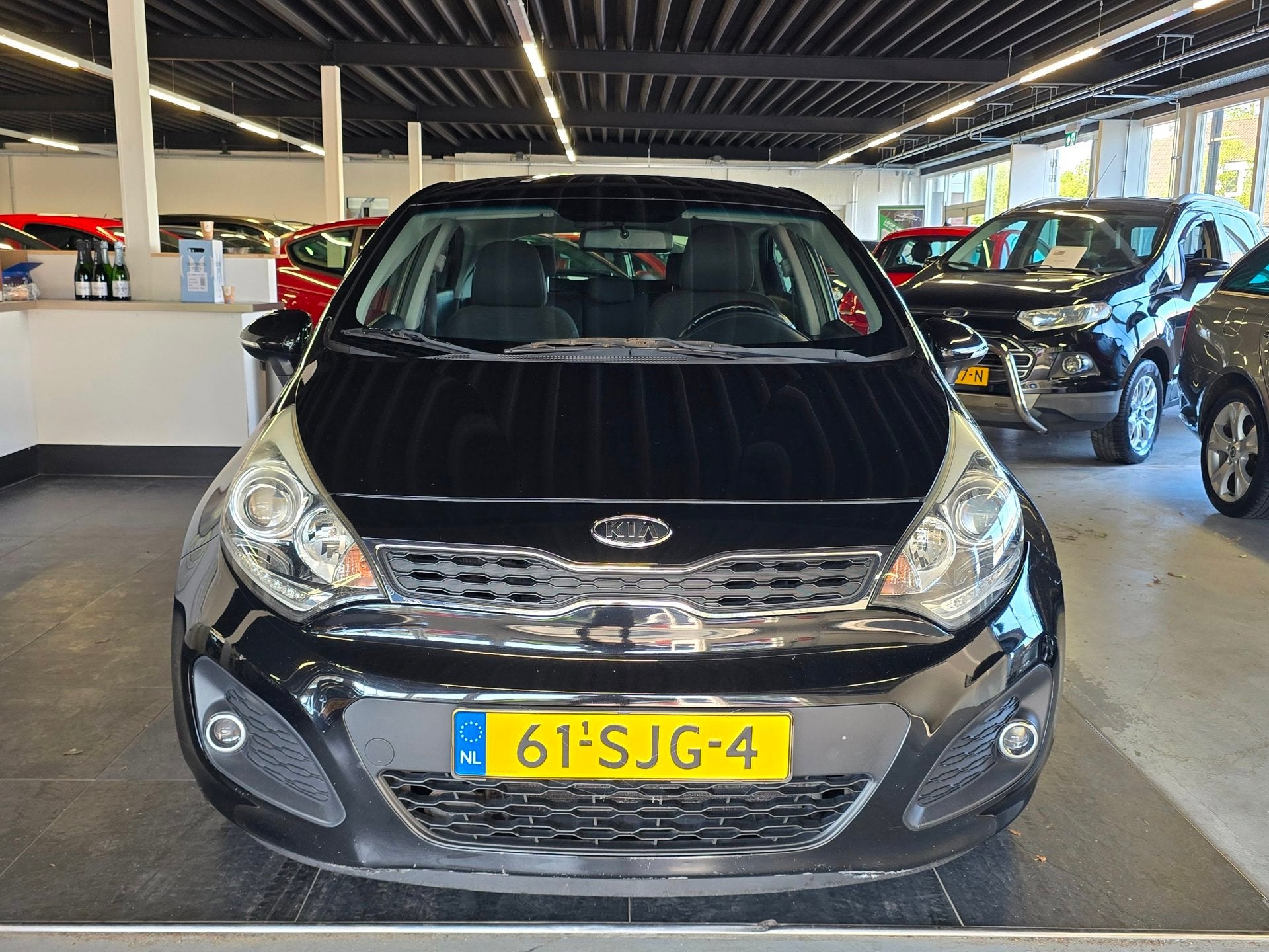 Kia Rio 1.2 CVVT Super Pack/AIRCO/CRUISE/BOEKJES/, Euro 5, Zwart, 4 cilinders, Zwart