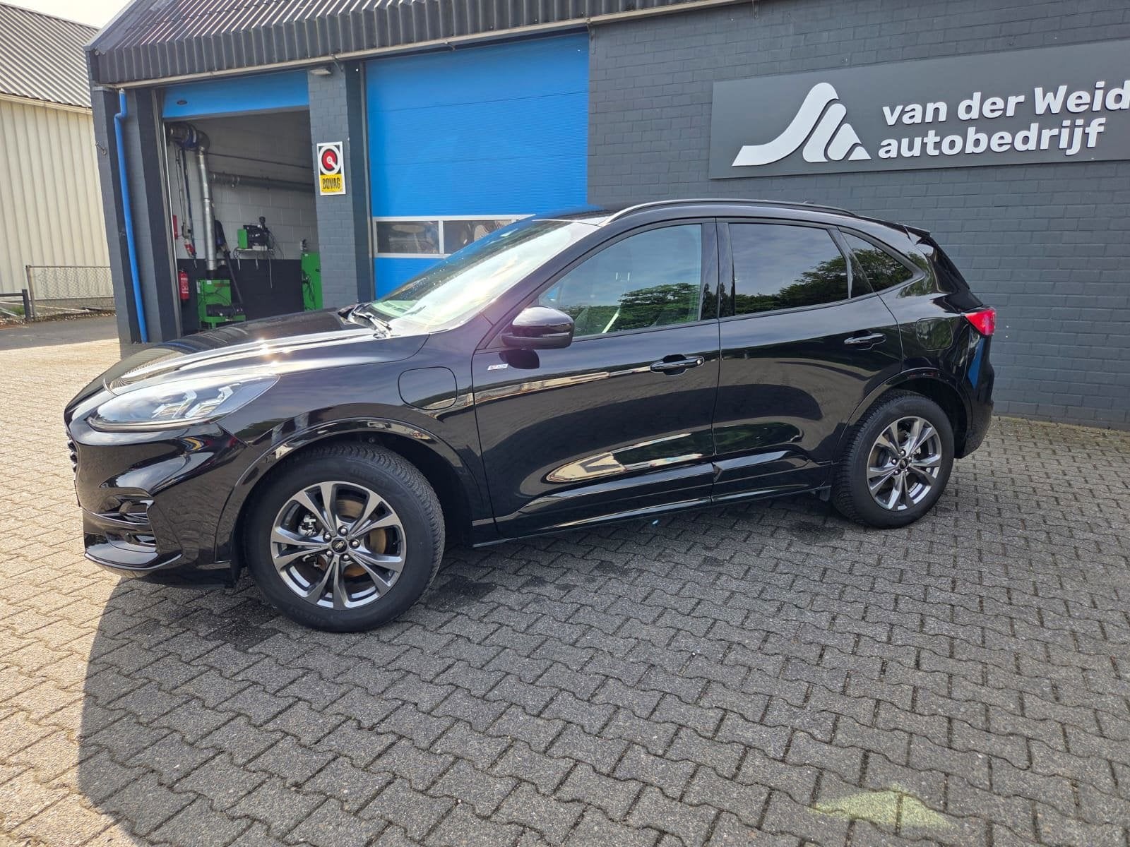 Ford KUGA 2.5 PHEV ST-Line X, Auto's, Gebruikt, 4 cilinders, Alcantara, Zwart