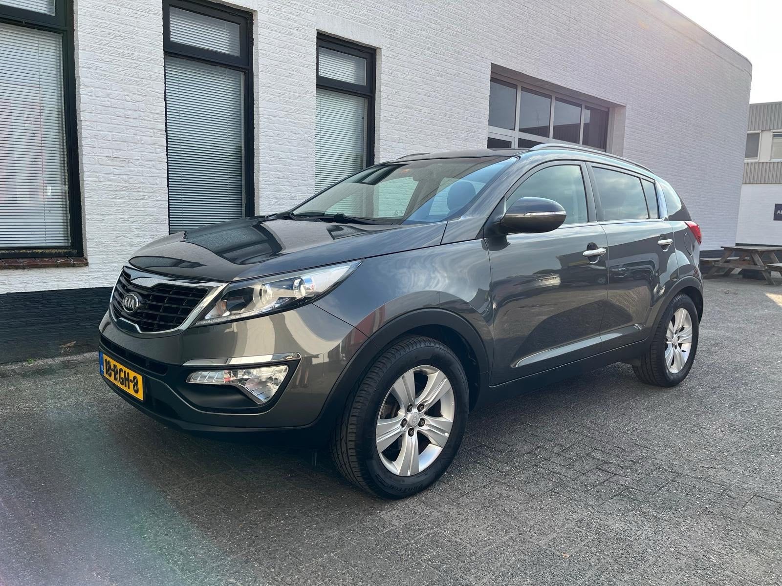 Kia Sportage 1.6 GDI 135pk Ecodynamics 2011 Grijs, Auto's, Kia, Voorwielaandrijving, 1280 kg, 4 cilinders, Leder en Stof