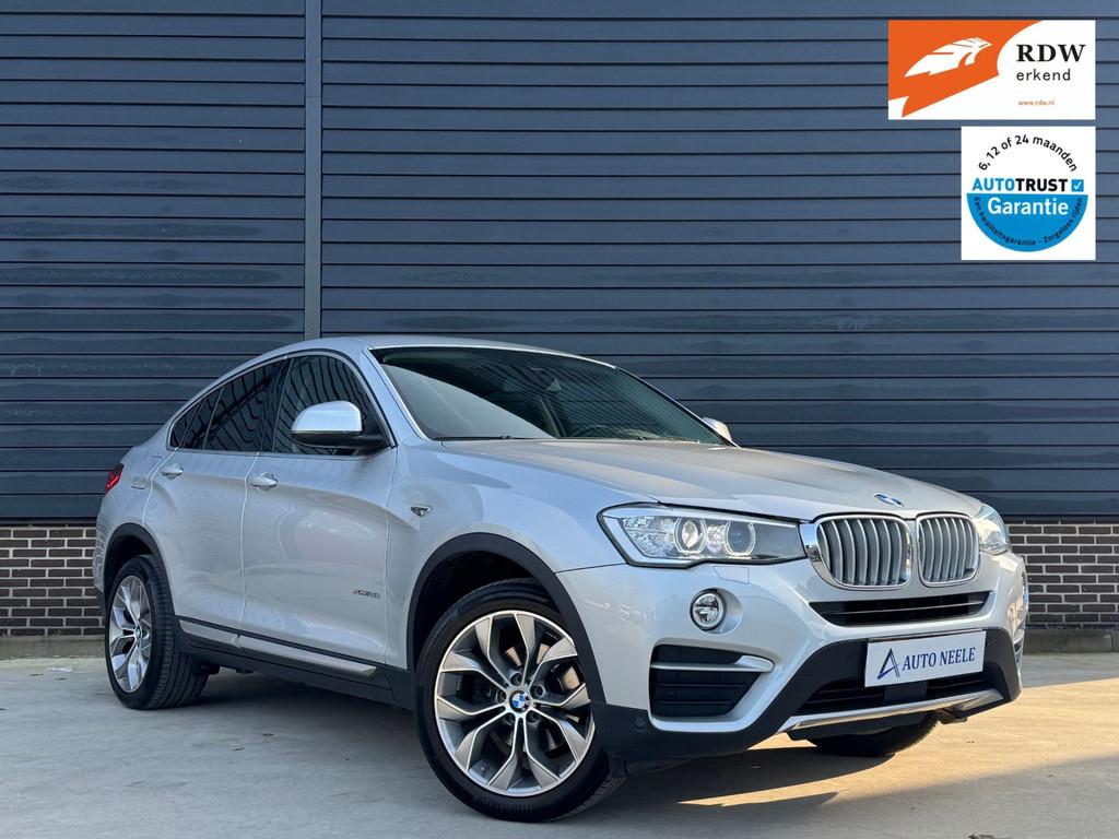 BMW X4 xDrive35i High Executive 306 pk Elektr stoelen, Head-, Auto's, BMW, Automaat, Gebruikt, 2000 kg, Bedrijf