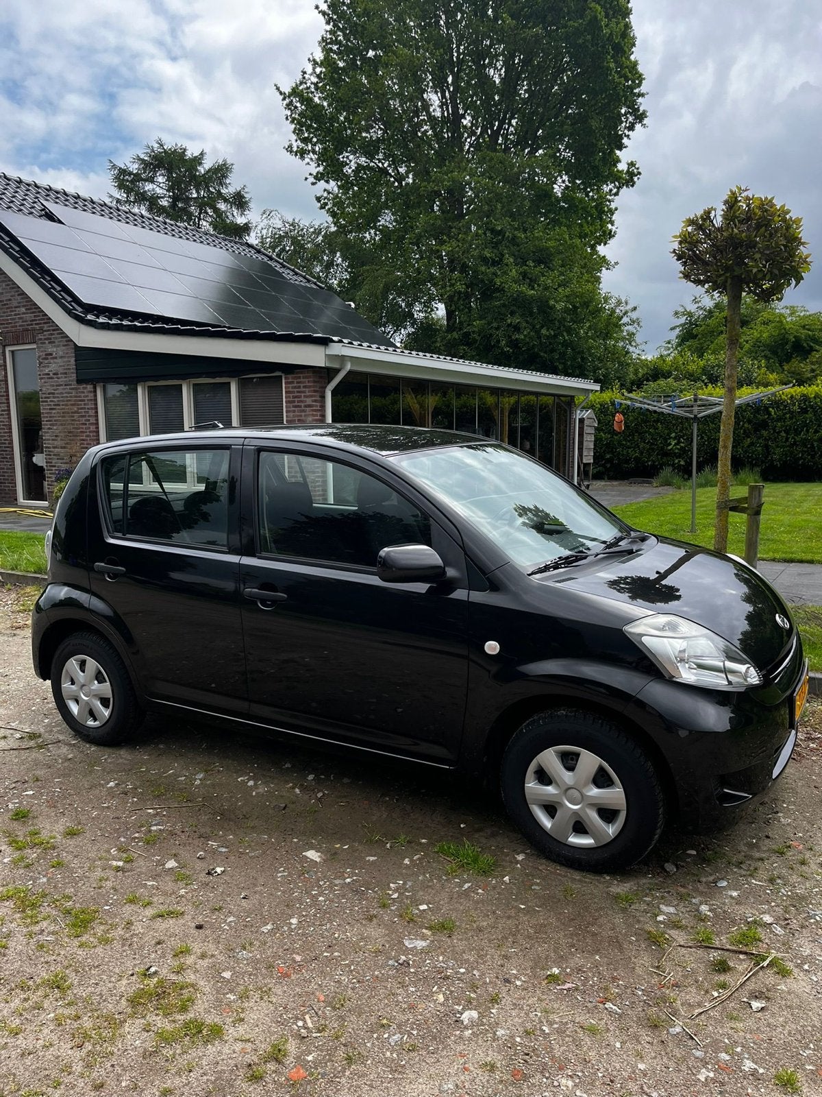 Daihatsu Sirion 1.0 51KW 2008 Zwart, Voorwielaandrijving, Zwart, Handgeschakeld, 3 cilinders