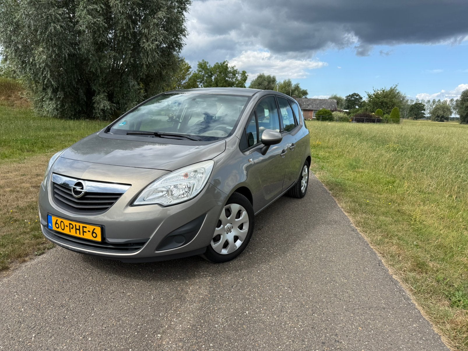 Opel Meriva 1.4 74KW 2011 Bruin nw apk met fietsendrager!!, Auto's, Voorwielaandrijving, 1398 cc, 4 cilinders, Bruin