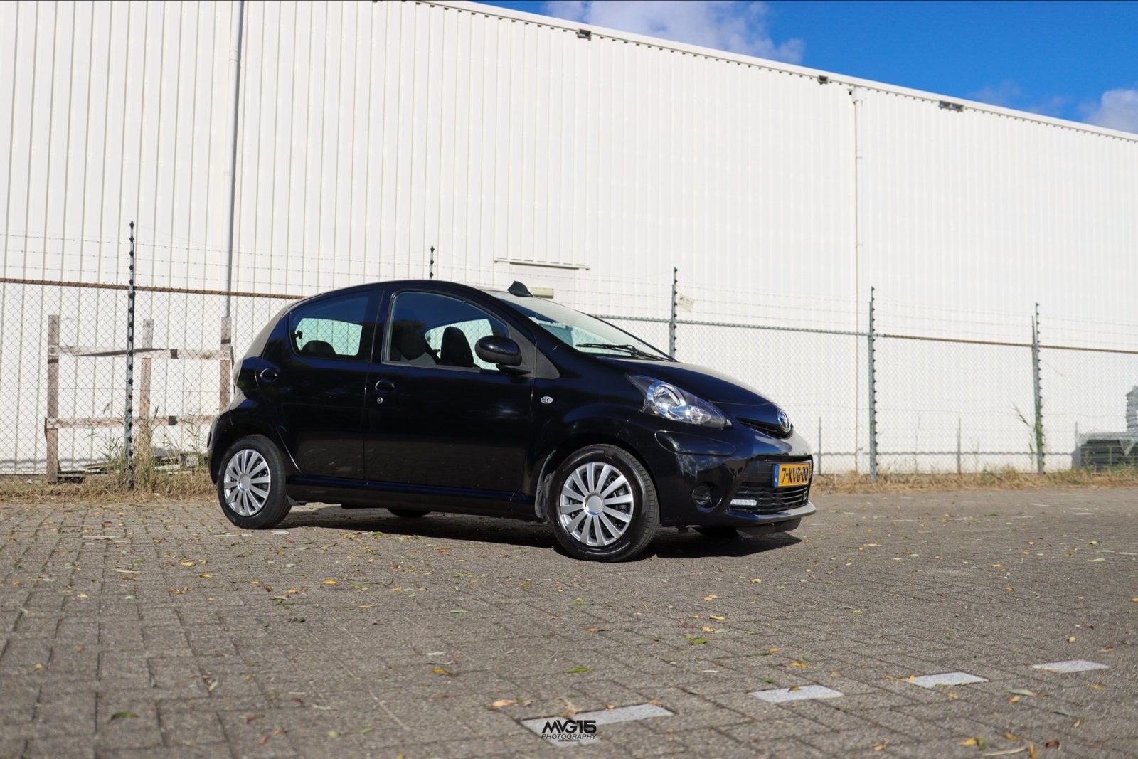 Toyota Aygo 1.0 12V Vvt-i 5DRS 2013 Zwart, Auto's, Voorwielaandrijving, Euro 5, Stof, 4 stoelen