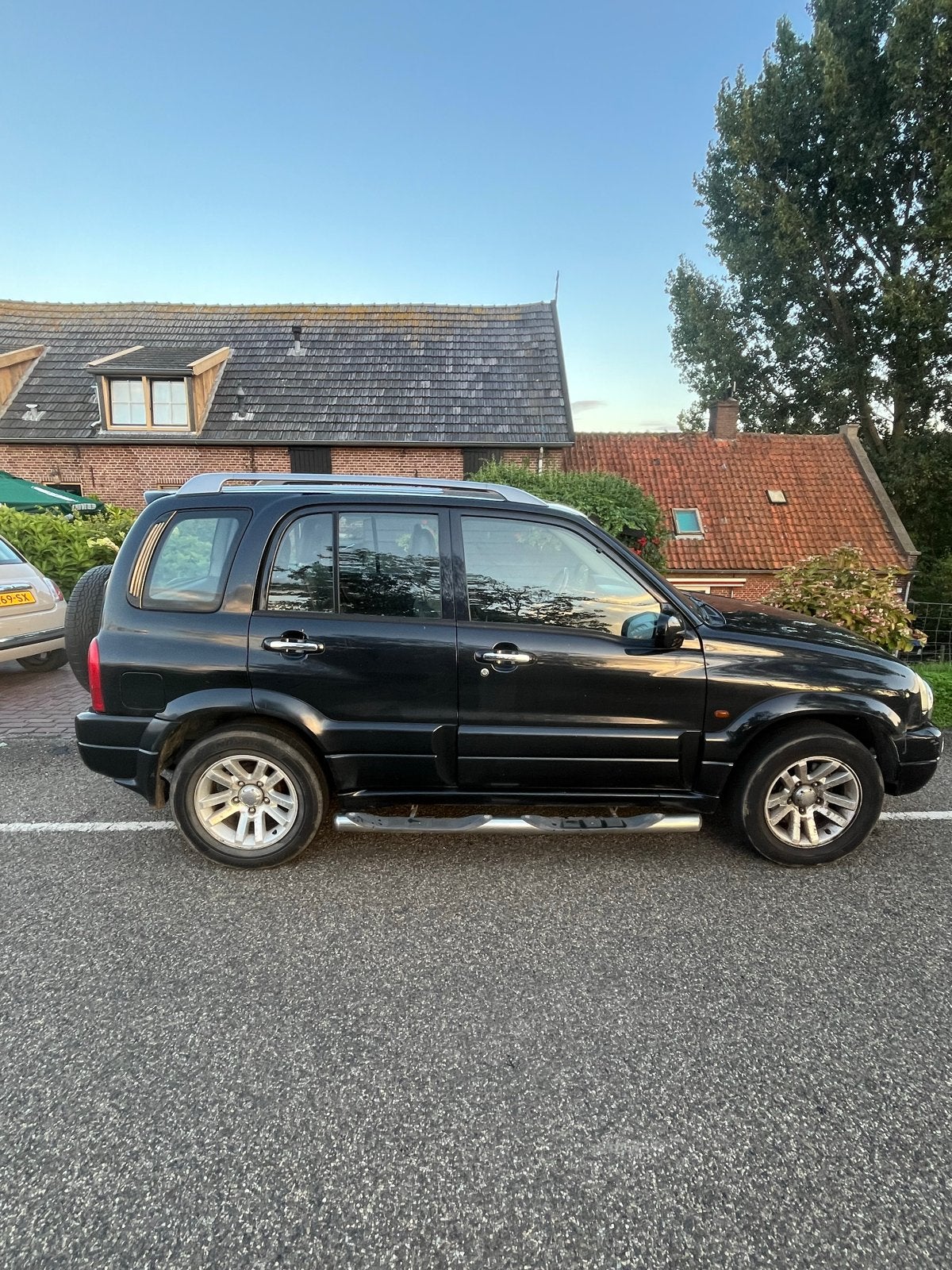Suzuki Grand Vitara 2.0 5D AUT 2005 Zwart, Auto's, Suzuki, Automaat, 1995 cc, Grand Vitara, Zwart