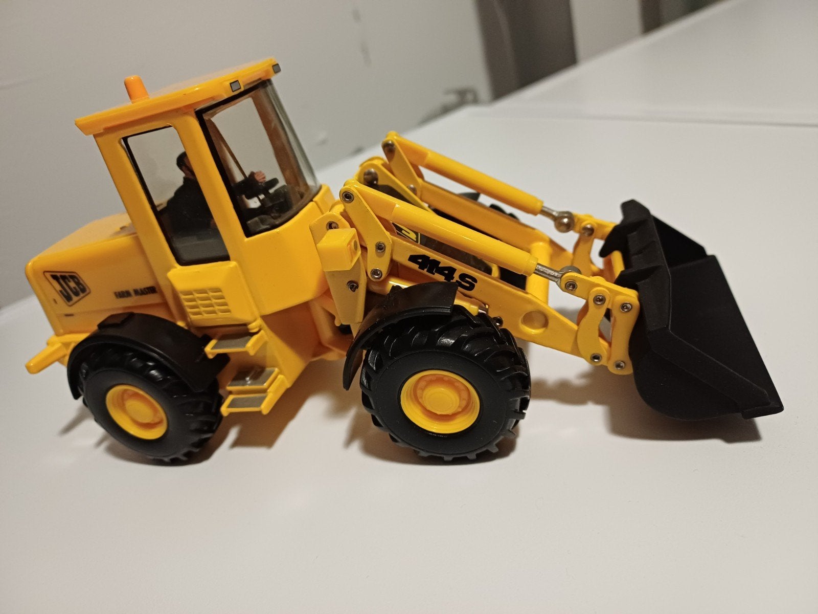 Britains Elite serie JCB Farmmaster 414s shovel, Hobby en Vrije tijd, Ophalen of Verzenden, Zo goed als nieuw, Tractor of Landbouw