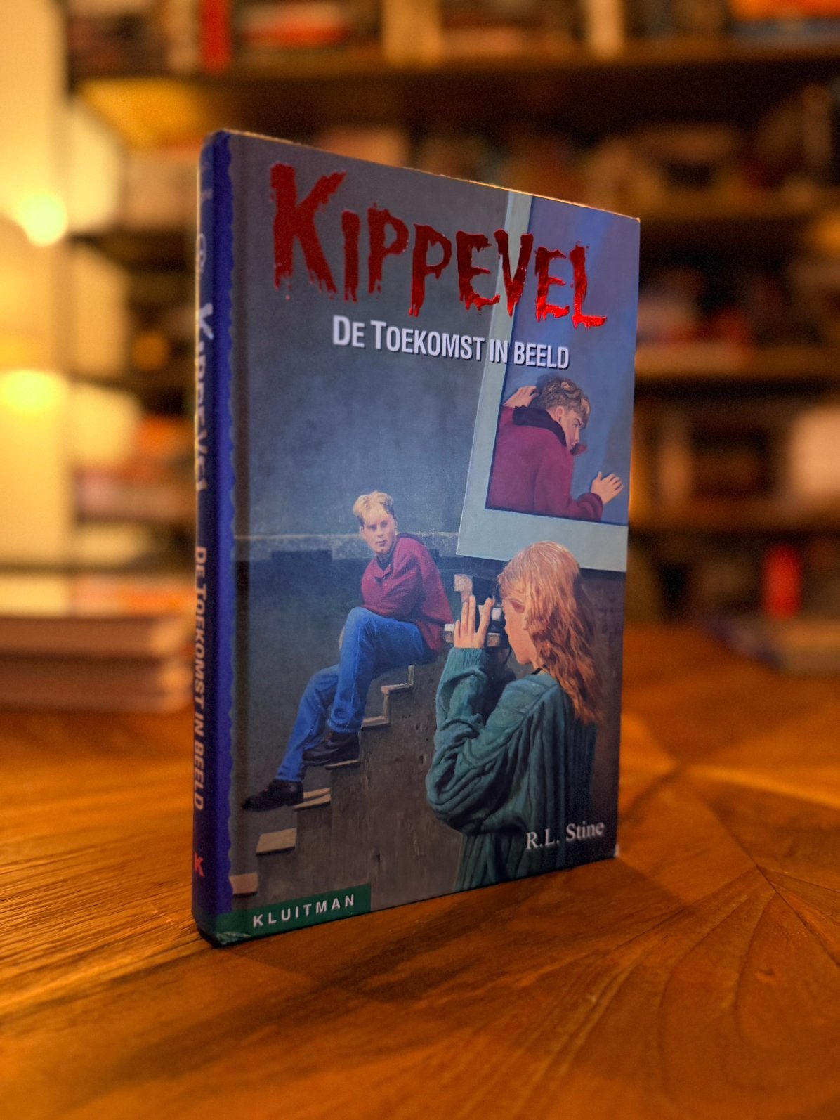 R.L. Stine - Kippevel - De toekomst in beeld, Ophalen of Verzenden, Zo goed als nieuw, R.L. Stine
