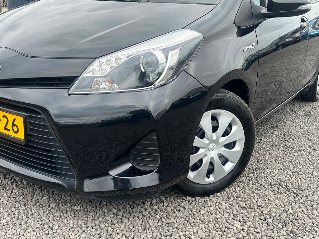 Toyota Yaris 1.5 Full Hybrid Aspiration/NAVI/CAMERA/NW APK, Auto's, Euro 5, Gebruikt, Zwart, 4 cilinders