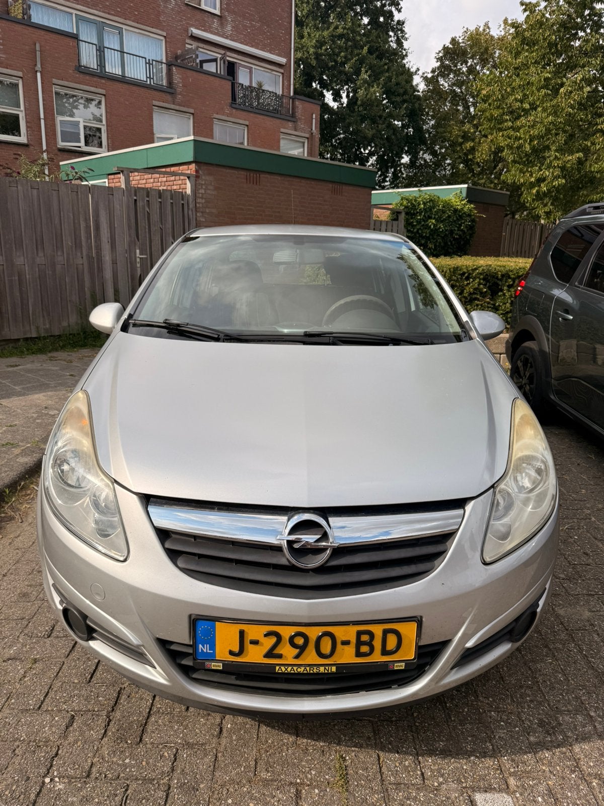 Opel Corsa 1.2 16V 5D 2009 Grijs, Auto's, Voorwielaandrijving, 4 cilinders, 1229 cc, 49 €/maand