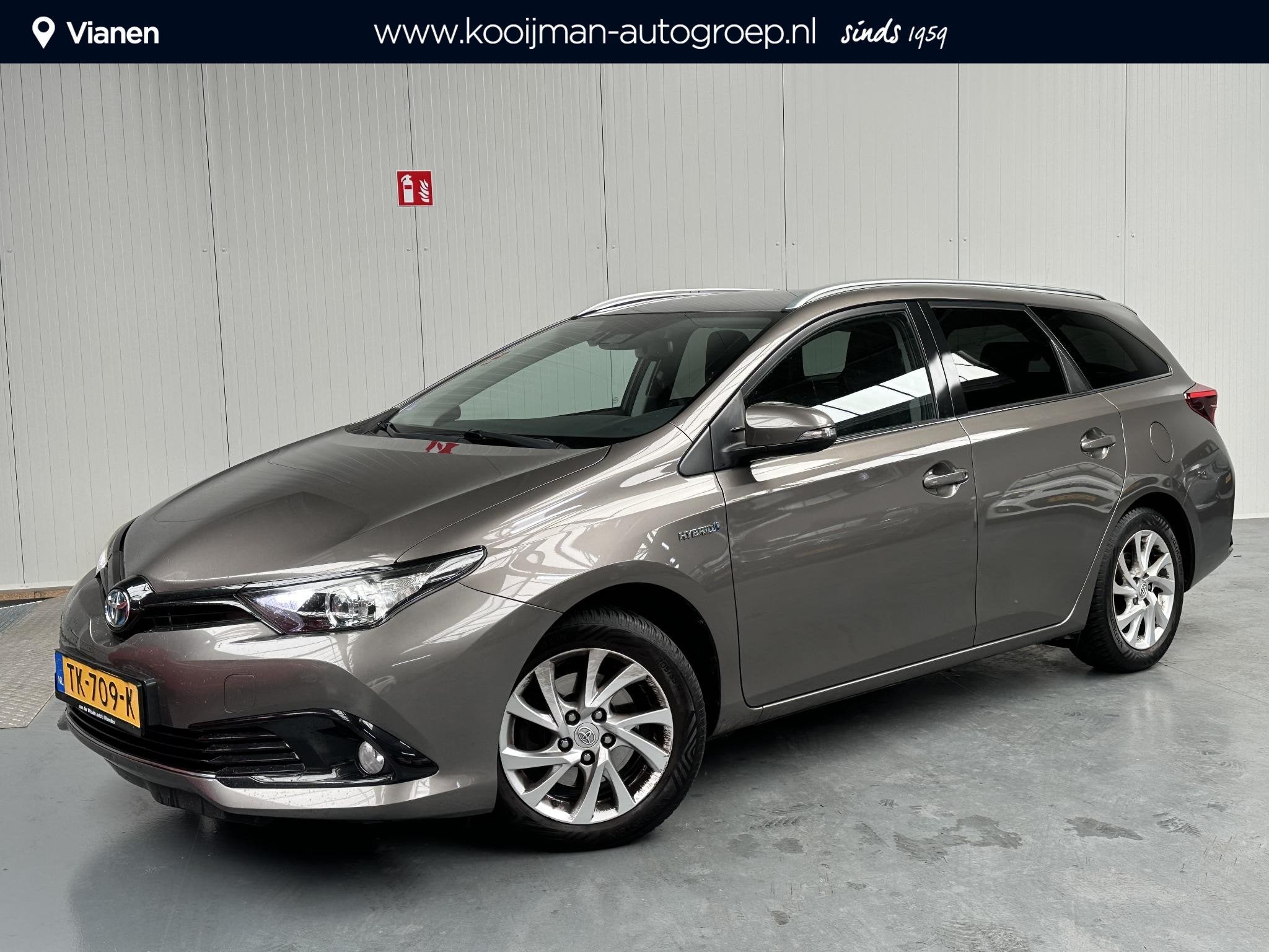 Toyota Auris 1.8 Hybrid Dynamic, Gebruikt, Euro 6, Automatische klimaatregeling, Origineel Nederlands