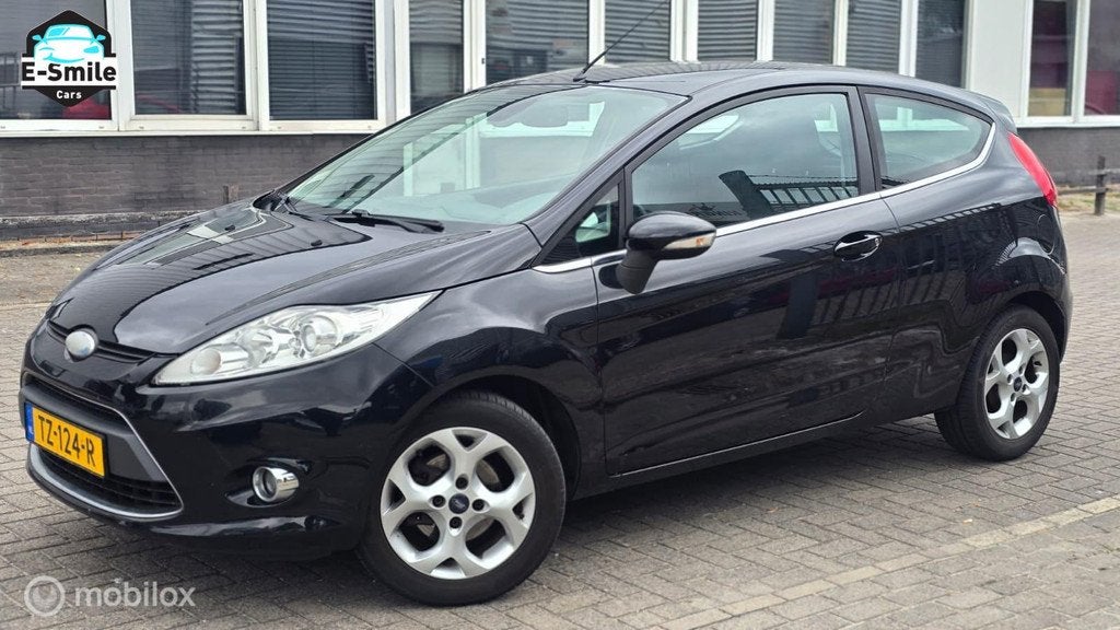 Ford Fiesta 1.25 Ghia/Airco/StoelVerwarming/MultiStuur, Voorwielaandrijving, Euro 5, 4 cilinders, Electronic Stability Program (ESP)