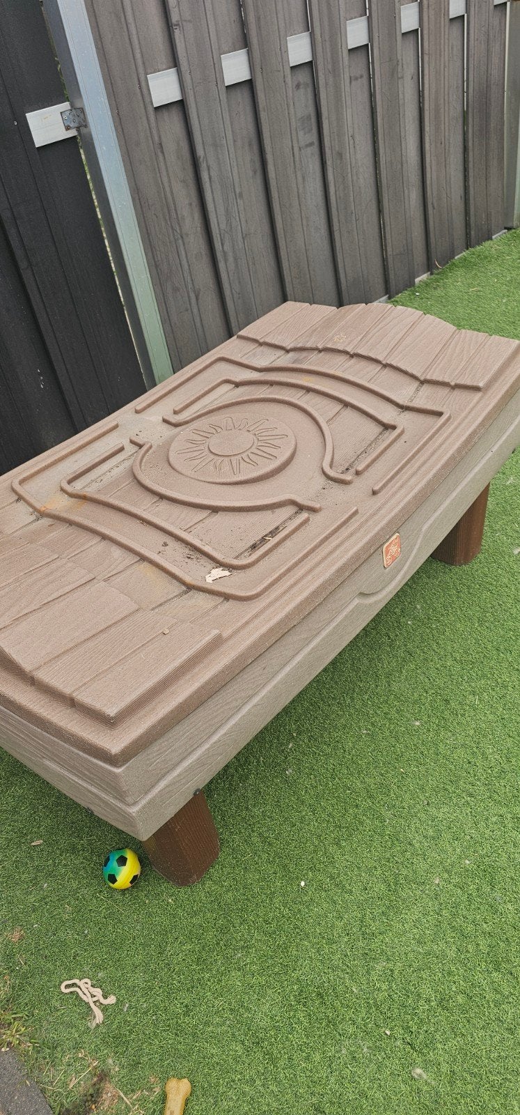 step 2 zandbak, Ophalen