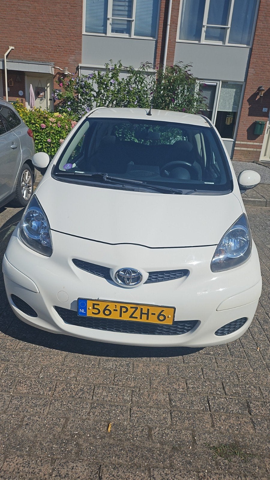 Toyota Aygo 1.0 12V Vvt-i 3DRS MMT 2011 Wit, Auto's, Voorwielaandrijving, Stof, 4 stoelen, Origineel Nederlands