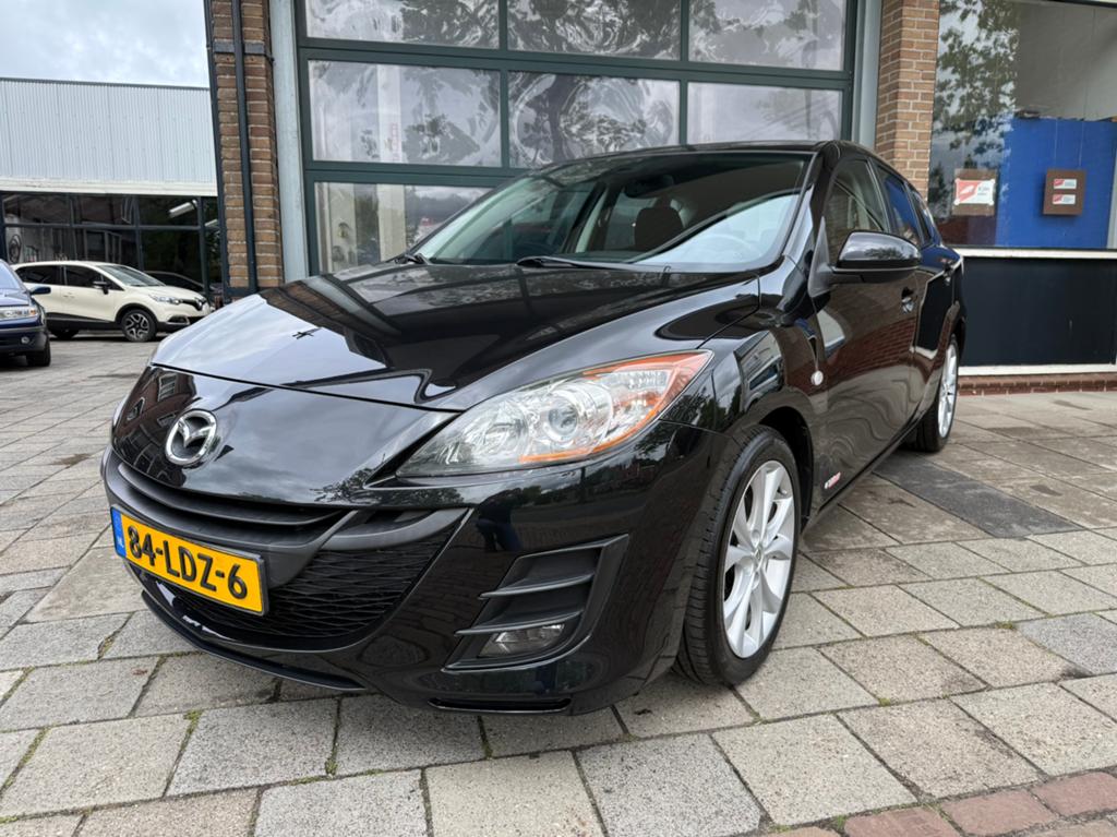 Mazda 3 2.0 Disi Hatchback 2010 | Stoelverw | Airco | Trekha, Auto's, Voorwielaandrijving, Zwart, 4 cilinders, Zwart