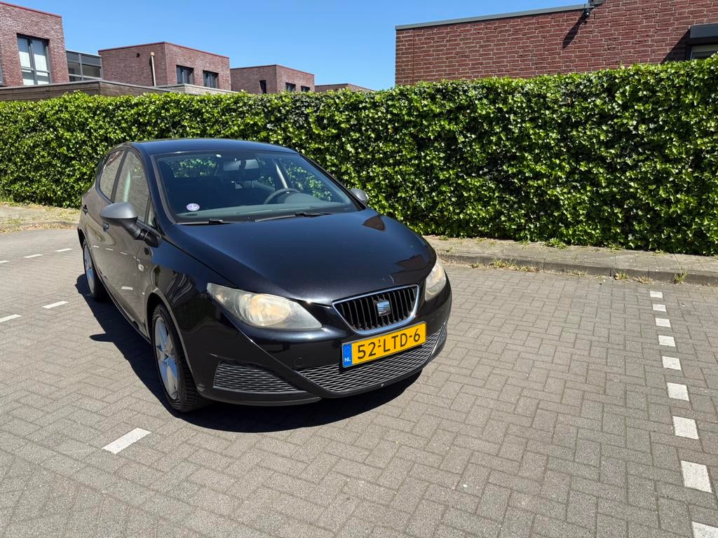Seat Ibiza 1.2 44KW 5DRS 2010 Zwart, Auto's, Voorwielaandrijving, 40 €/maand, 1198 cc, Origineel Nederlands