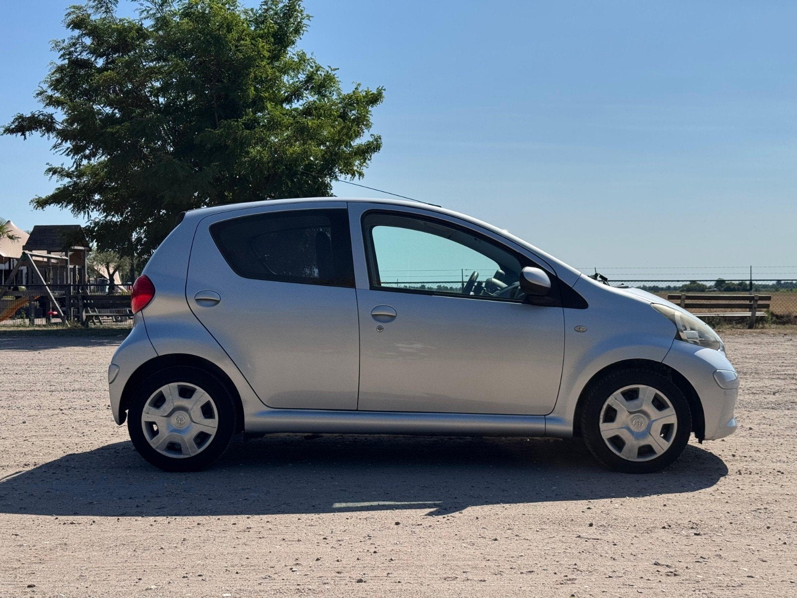 Toyota Aygo 1.0 12V Vvt-i 5DRS 2007 Grijs, Auto's, Voorwielaandrijving, 4 stoelen, 68 pk, Origineel Nederlands