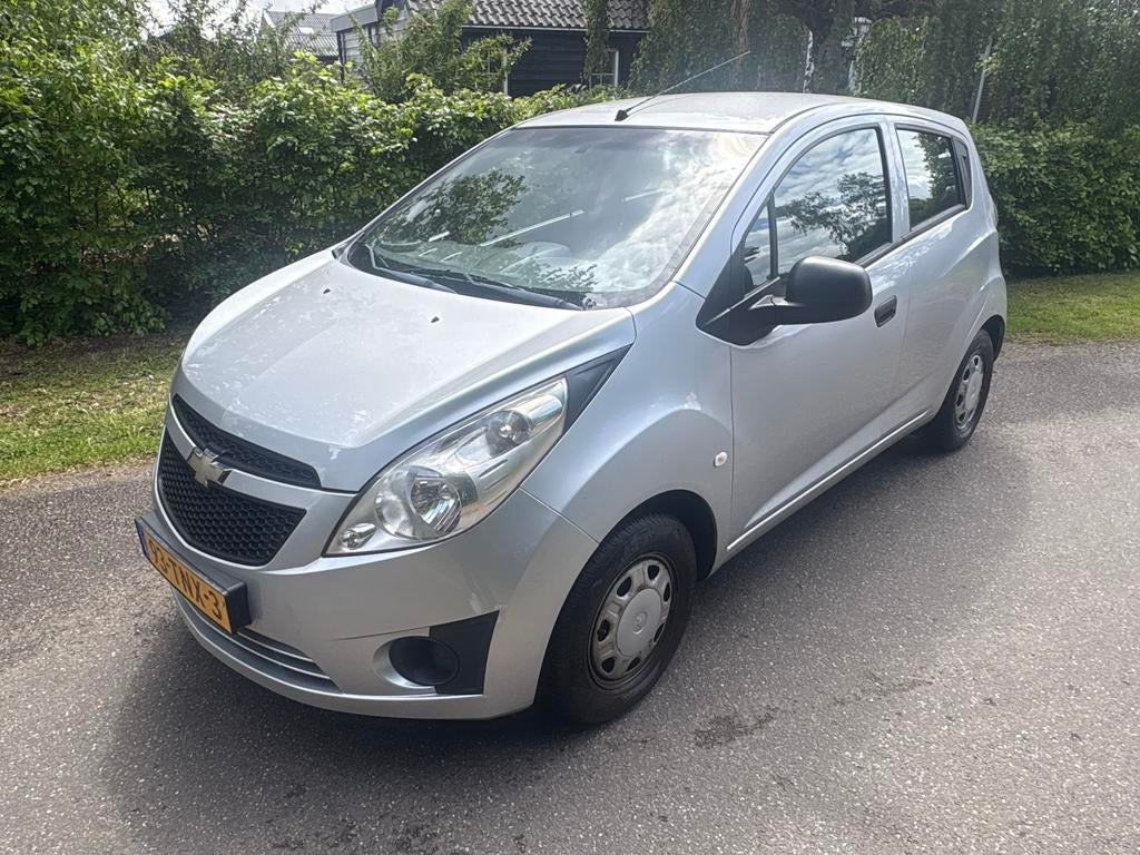 Chevrolet Spark 1.0 Bifuel 2012 Grijs, Auto's, Chevrolet, 15 km/l, 37 €/maand, 4 cilinders, Origineel Nederlands