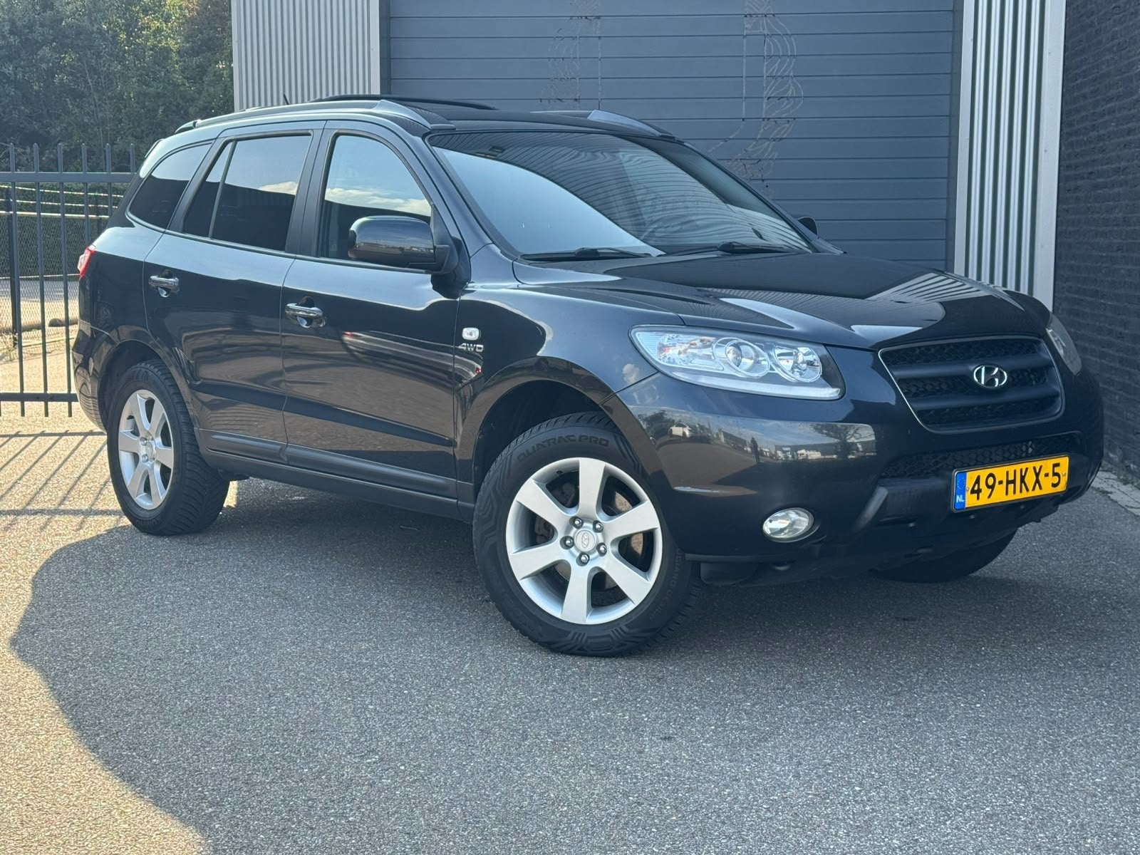 Hyundai Santa Fe 2.7i V6 4WD Freestyle Ecc|Automaat|Navi, Auto's, Automaat, Gebruikt, 2000 kg, Zwart