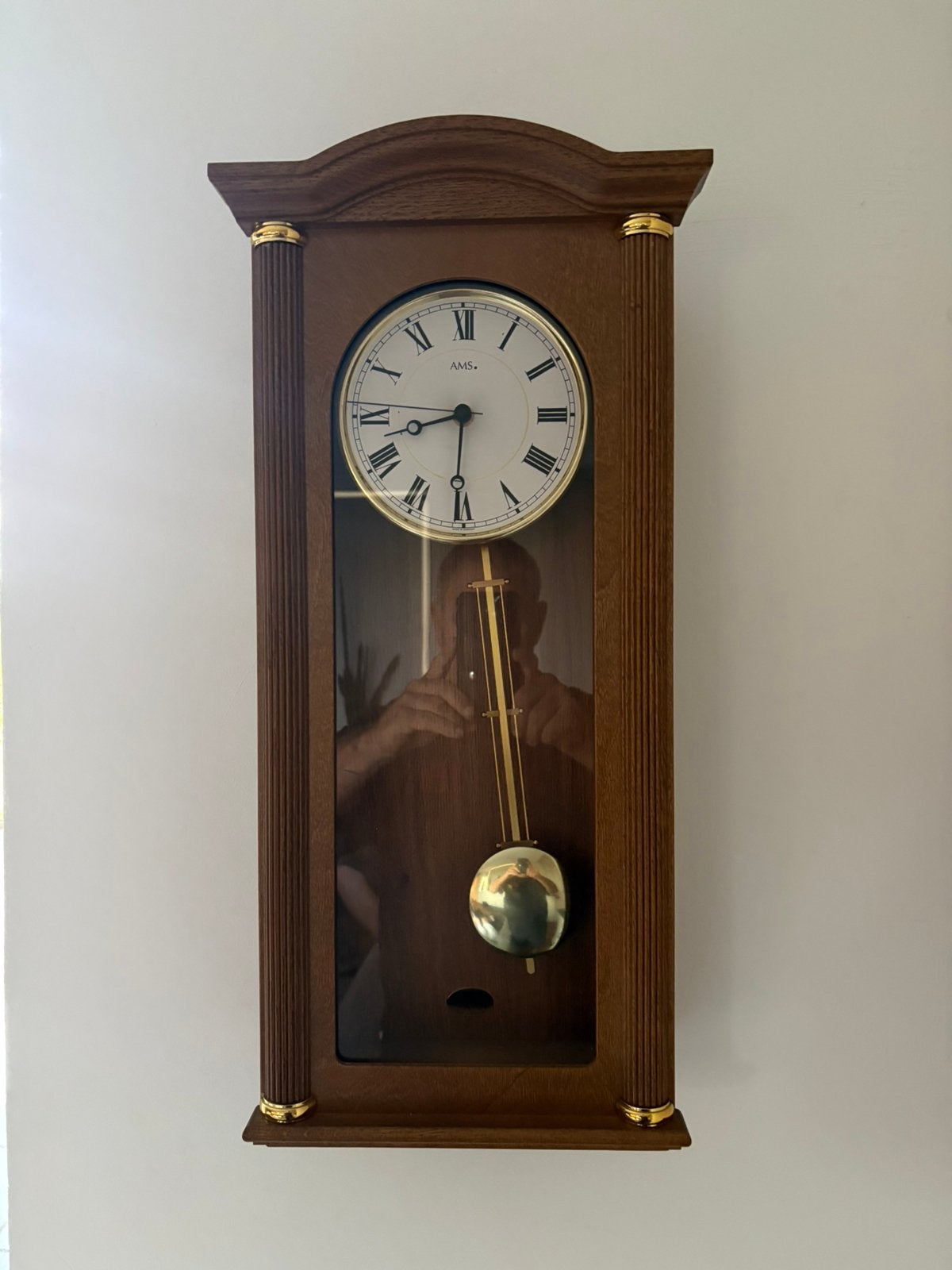 Wandklok met slinger, Ophalen