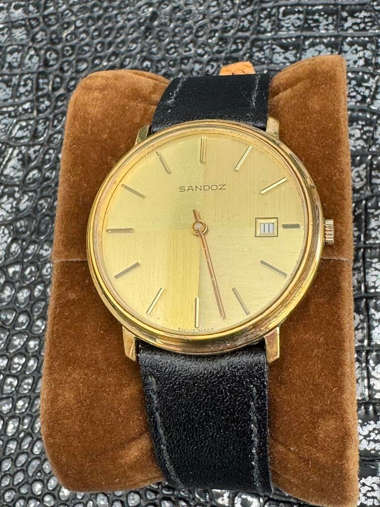 Vintage Sandoz Polshorloge Goudkleurig met Zwarte Band, Ophalen of Verzenden