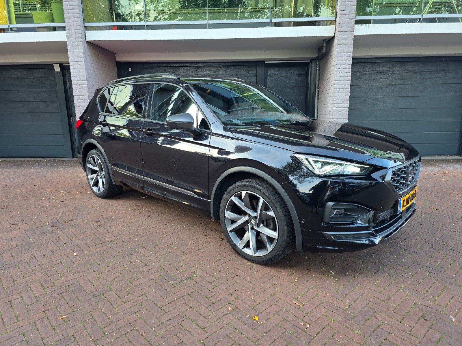 Seat Tarraco 2.0 TSI 190pk 4DRIVE Dsg-7 2021 Zwart, 7pers, Auto's, Dealer onderhouden, 1984 cc, 7 stoelen, Zwart
