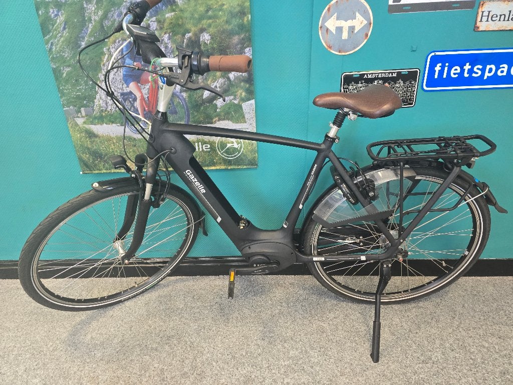 Elektrische fiets ,, betaalbaar en met weinig km ,,, Fietsen en Brommers, Elektrische fietsen, Ophalen, Zo goed als nieuw, 50 km per accu of meer
