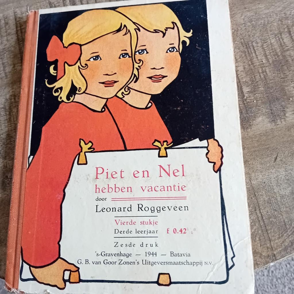 Schoolboekje "Piet en Nel hebben vakantie" uit 1944, Boeken, Gelezen, Overige vakken, Leonard Roggeveen, Ophalen of Verzenden