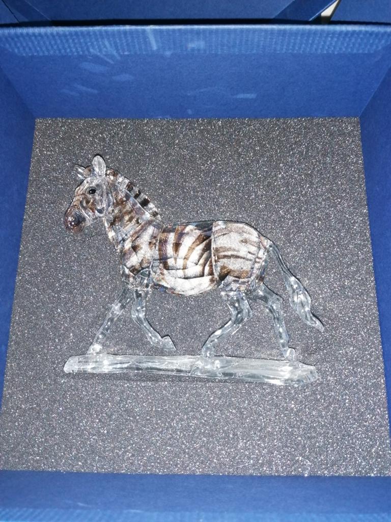 Swarovski zebra in lopende positie, Verzamelen, Swarovski, Ophalen of Verzenden, Figuurtje