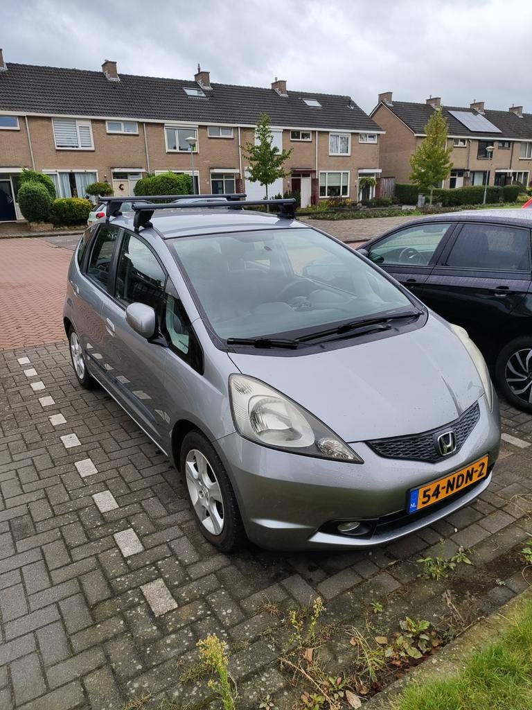 Honda Jazz 1.4 2010 Grijs, Auto's, Honda, Particulier, Jazz, ABS, Airbags, Airconditioning, Alarm, Centrale vergrendeling, Climate control