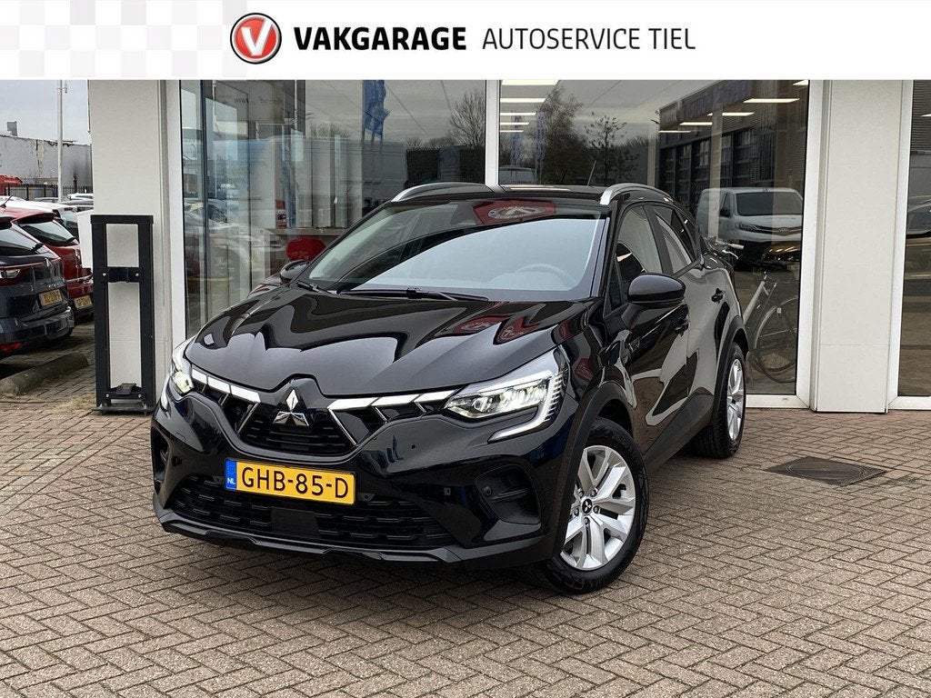 Mitsubishi ASX 1.6 HEV AT Intense Navigatie Apple CarPlay/An, Auto's, Mitsubishi, Stof, Gebruikt, 4 cilinders, Zwart