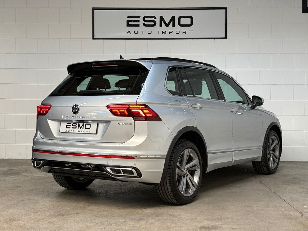 Volkswagen Tiguan 1.4 TSI eHybrid R-Line Business+ Panoramad, Auto's, Volkswagen, Zwart, 4 cilinders, Leder en Stof, Hybride Elektrisch/Benzine