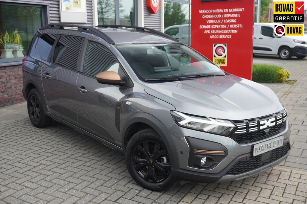 Dacia Jogger 1.6 Hybrid 140 Extreme 5p / Carplay / Camera /, Auto's, Dacia, Stof, Gebruikt, Grijs, Hybride Elektrisch/Benzine