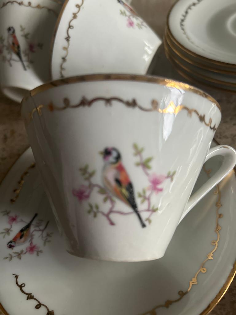 Vintage porseleinen kop en schotel set met vogeldecor, Ophalen of Verzenden