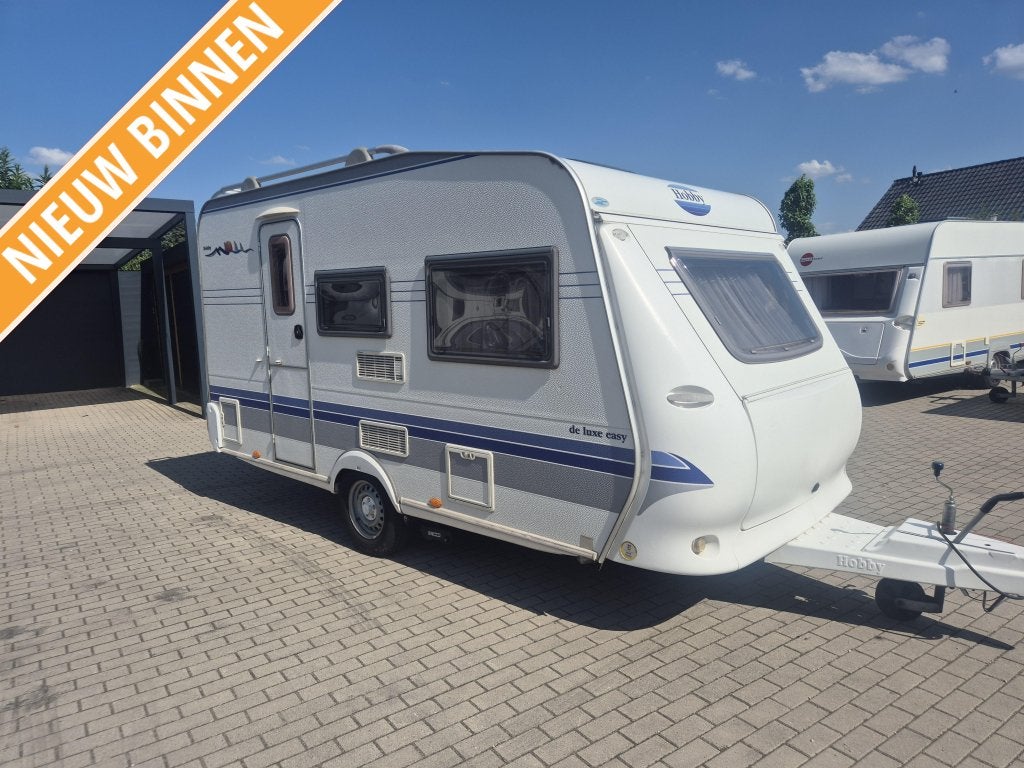 Hobby de Luxe 400 SF + Mover Fietsendrager Panorama luifel, Caravans en Kamperen, Caravans, Schokbreker, Hobby, Bedrijf, Treinzit