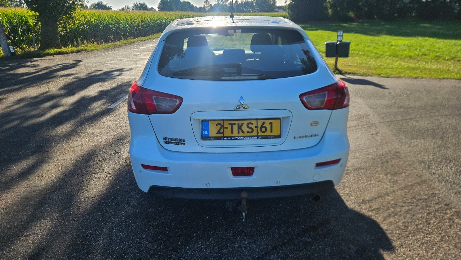 Mitsubishi Lancer 1.6 Cleartec Sportback 2014 Wit, Auto's, Voorwielaandrijving, Stof, Zwart, 4 cilinders