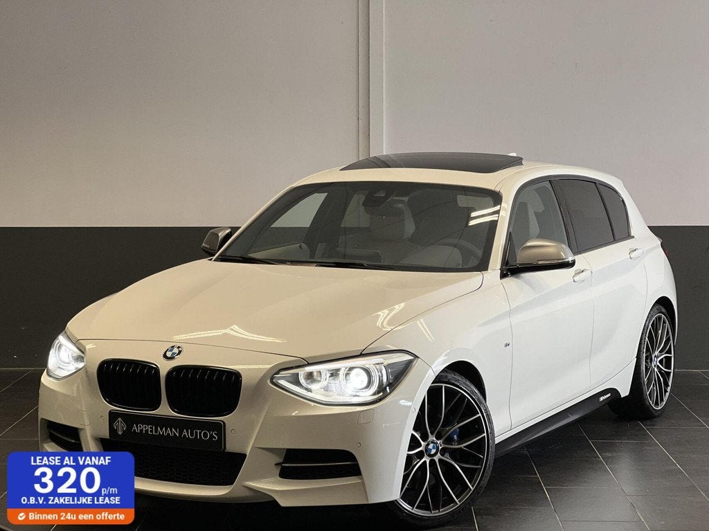BMW 1-serie M135i M-Performance FULL|H&K|Camera|Keyless|Schu, Achterwielaandrijving, 320 pk, Wit, Leder