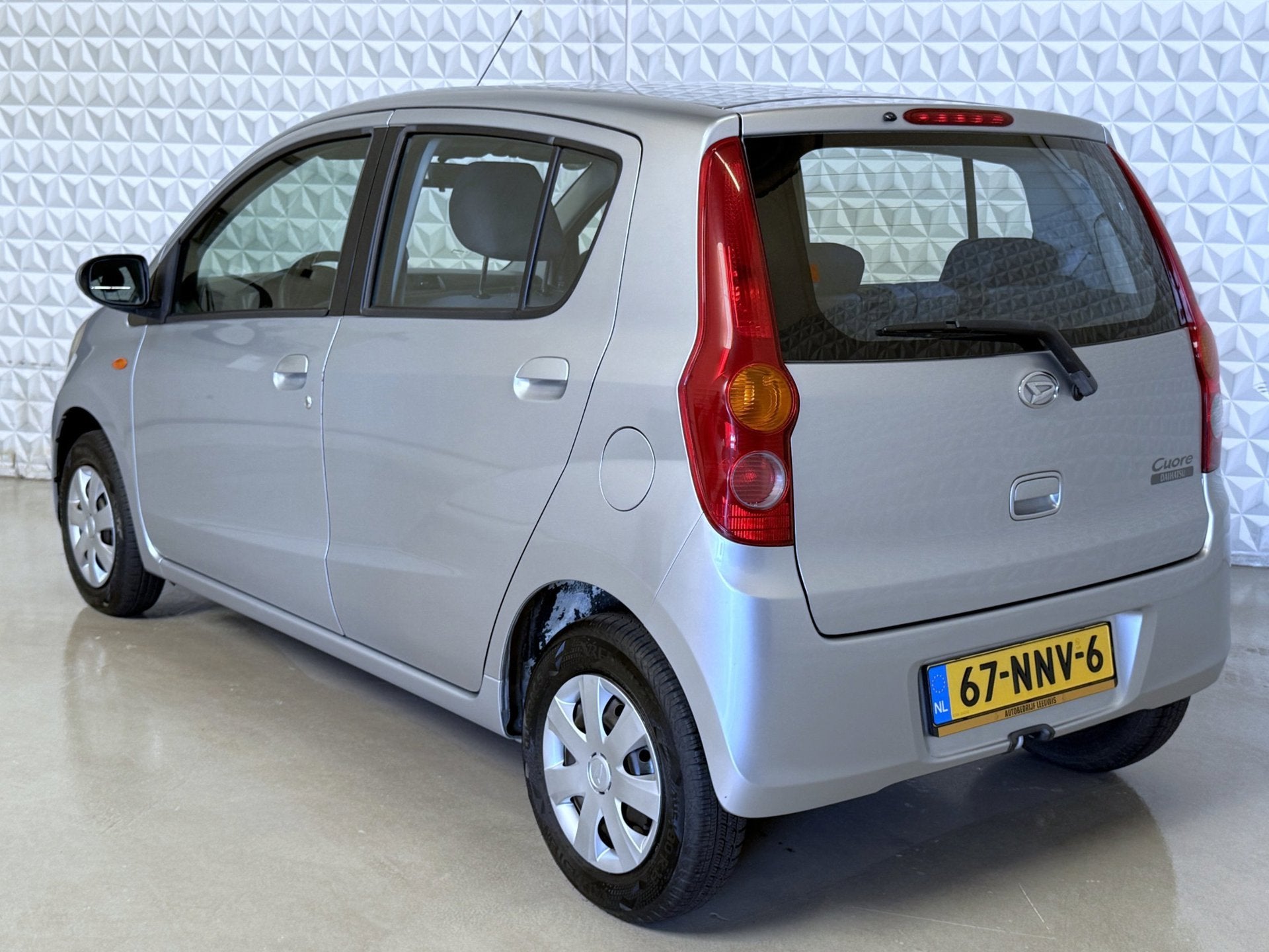 Daihatsu Cuore 1.0 Comfort Airco AUTOMAAT / 87.000km (2010), Auto's, Daihatsu, 18 €/maand, 4 stoelen, Cuore, Bedrijf