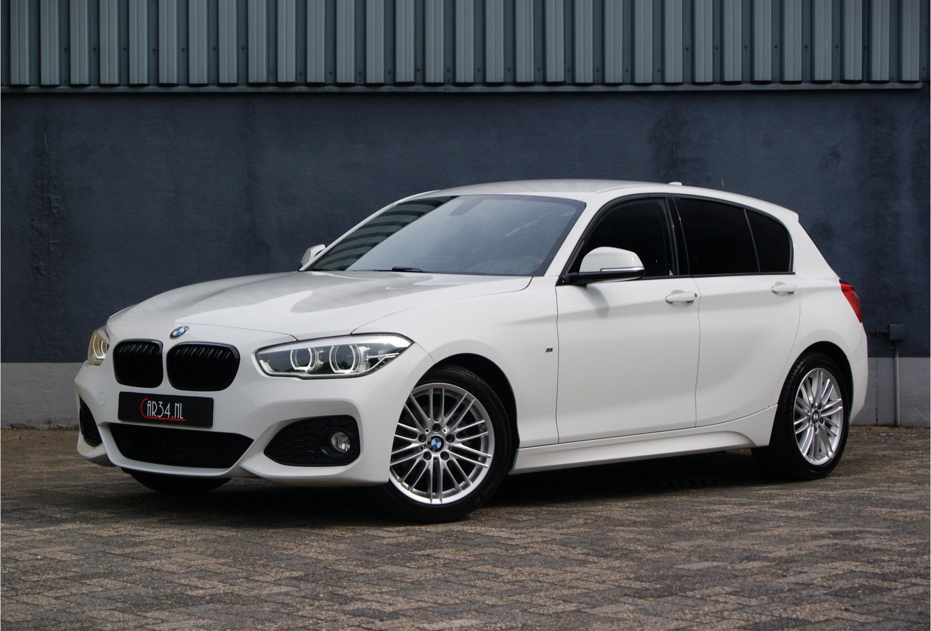 BMW 1-serie 116i M Sport Facelift Shadow PDC/LED/Alarm, Auto's, BMW, 1-Serie, Achterwielaandrijving, Alcantara, Wit