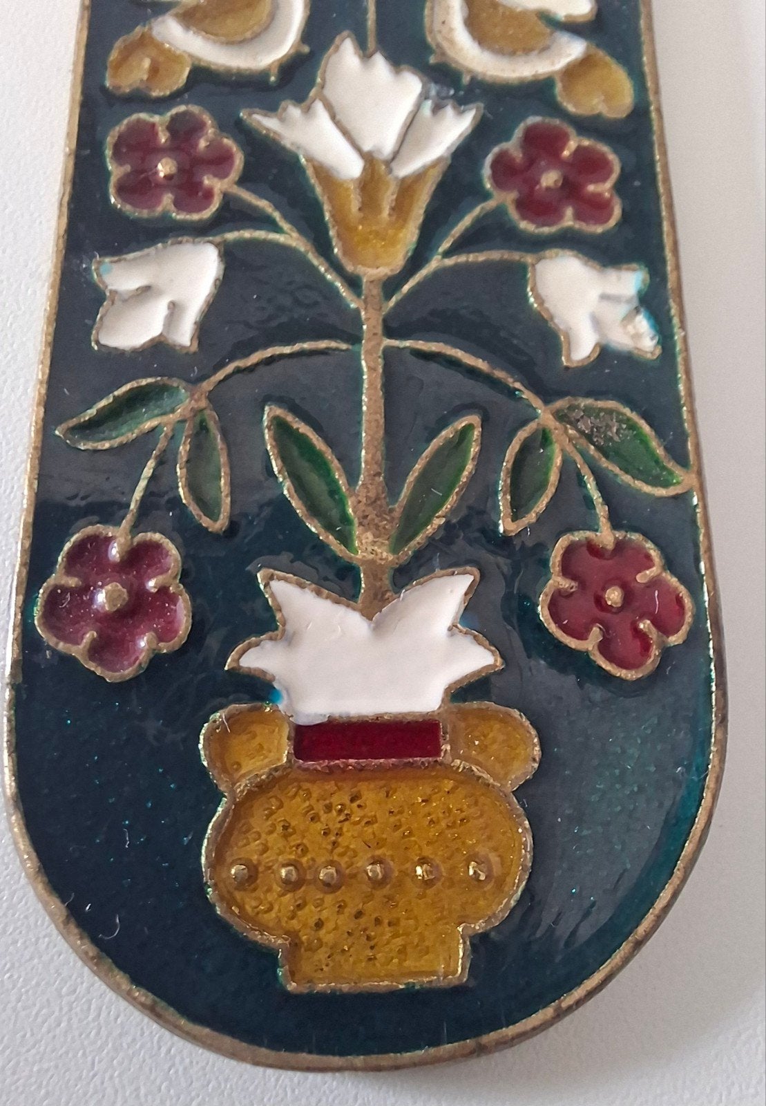Vintage bronzen flesopener met emaille decoratie., Ophalen of Verzenden