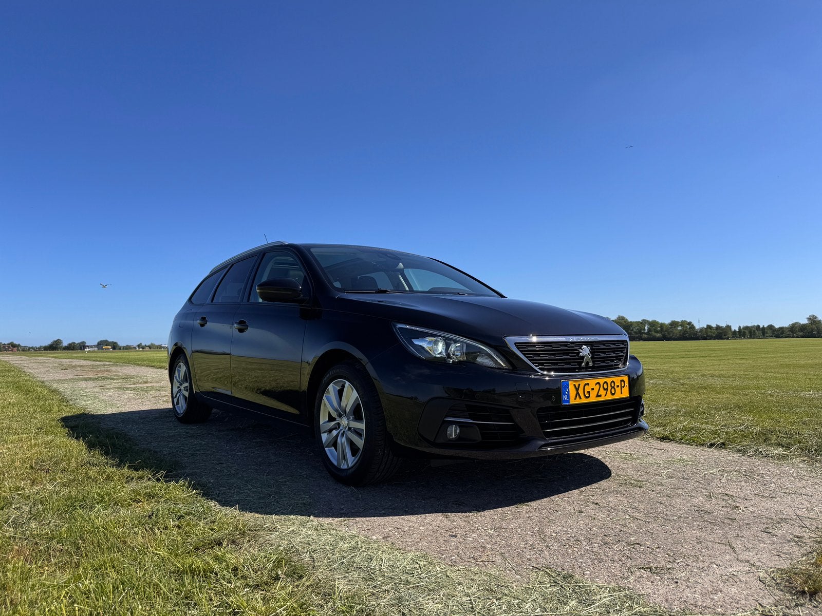 Peugeot 308sw 1.2 110pk | Trekhaak | Leder | Pano | Nwe APK, Auto's, Peugeot, Voorwielaandrijving, Zwart, 1199 cc, Automatische klimaatregeling