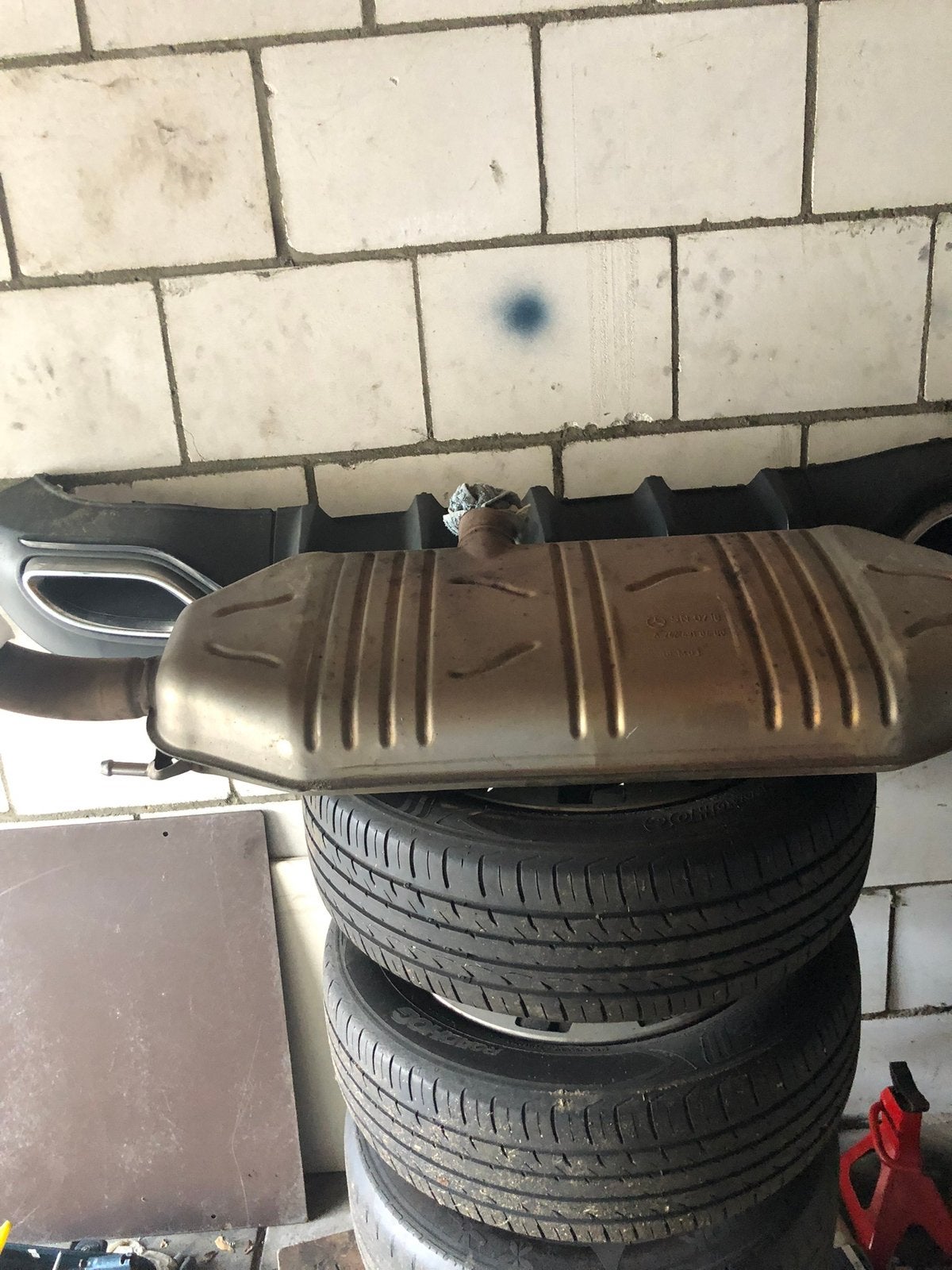 Uitlaat achterdemper mercedes A200 AMG, Ophalen
