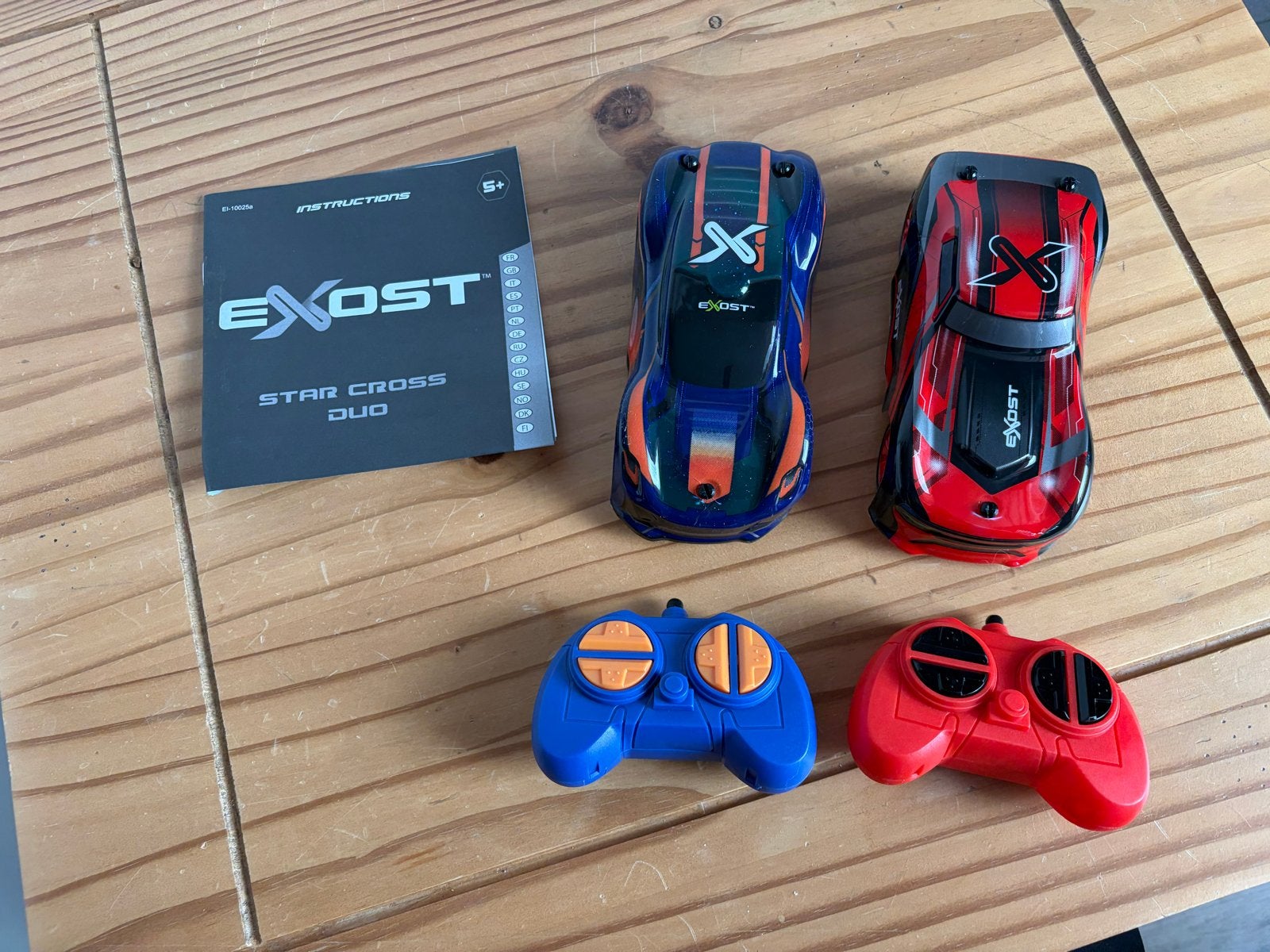 Exost Star Cross Duo RC auto's - blauw en rood, Hobby en Vrije tijd, Elektro, Ophalen of Verzenden, Zo goed als nieuw, Auto onroad
