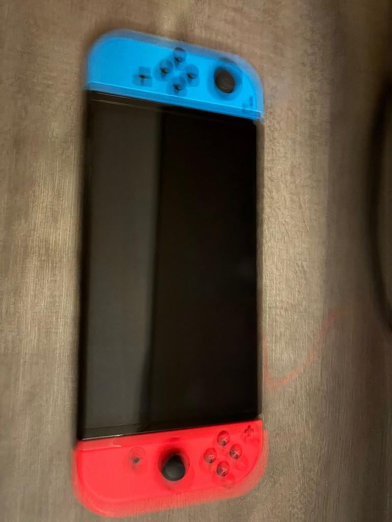 Nintendo Switch met Joy-Cons (blauw/rood), Ophalen of Verzenden, Zo goed als nieuw, Met 2 controllers, Switch Original