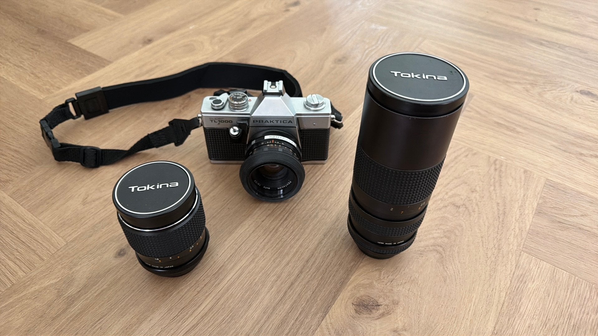 Praktica Super TL1000 Spiegelreflexcamera met 3 lenzen, Ophalen of Verzenden, Gebruikt, Spiegelreflex, Overige Merken